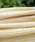 Close-up of Shade Cloth 7x7ft With 90 Percent Sun Blocking, Durable HDPE Shade Mesh Tarps For Patio Pergola in beige color.
