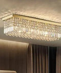 6 Light Modern Crystal Chandelier Gold Rectangular Frame With K9 Crystal Raindrops Flush Mount Ceiling Light installed in a room