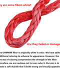 Close-up of red synthetic UHMWPE soft shackle showing fiber detail, part of Red Recovery Ring And 2 Red Soft Shackles Kit.