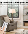 Person using Wireless Remote Control Outlet Switch Kit With 5 Outlets And 2 Remotes in living room setting