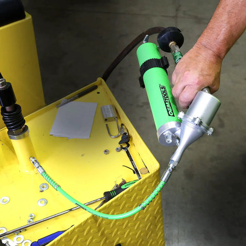 Beefy Heavy Duty Pneumatic Grease Gun With 6000 PSI for Continuous Lubrication 18 Inch Hose and Coupler on yellow surface