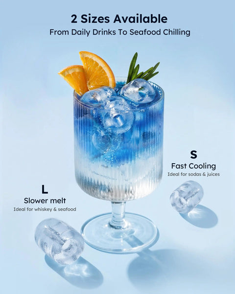 Fast Countertop Ice Maker Turns Out Eight Bullet Shaped Cubes In Six Minutes While Pumping Twenty Six Point Five Pounds Daily With Ample Water Reservoir For No Sweat Bar Setup And Always Chill Cocktails Or Quick Saturday Sips. Ice cubes chill a blue drink with orange garnish, showcasing size options for cocktails and seafood.