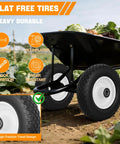 Flat Free 4.10/3.50-6 Replacement 12 Inch Wheel With 1 In. Axle Bore shown on wheelbarrow in garden