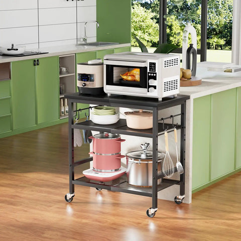 Rolling Kitchen Microwave Cart With 3 Tiers On Wheels in a bright kitchen holding microwave and cookware