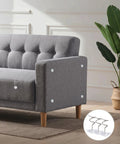 Sixty Premium Upholstery Tacks Keep Slides In Check With Zero Slipping Slick Twist Pins on gray couch fabric.