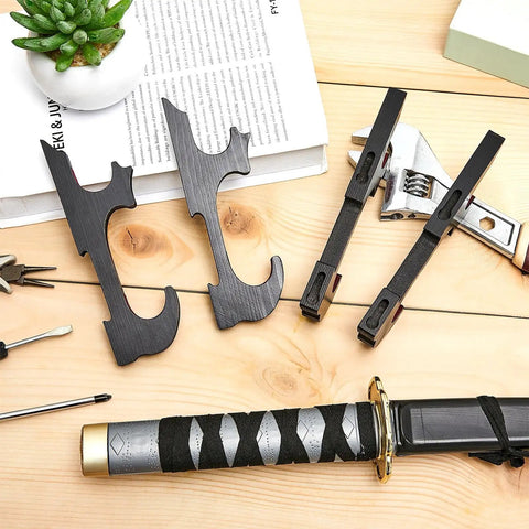 Sword Wall Mount Hanger Set For Adjustable Display Rack For Samurai Swords, 4 pieces, black hardware with tools on wooden surface.