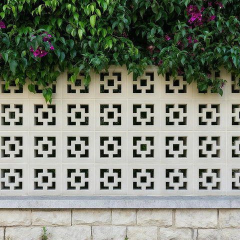 Two Pack Concrete Breeze Brick Molds With 11.81 Inch Double Square Pattern used in a garden wall decor installation.