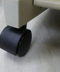 2 Inch Twin Wheel Office Chair Caster With 5 16 Inch Threaded Stem Diameter 75 Lb Load Capacity Per Caster Black Swivel Wheel For Office Chairs Durable Plastic Caster For Smooth Movement And Easy Floor Compatibility installed view