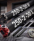 Pair Of 2 Inch Garage Door Torsion Spring Set With Non Slip Winding Bars And Center Bearing Black Coated 0.250x2x30 Replacement And DIY Install Kit For Up To 16,000 Cycles, showing springs, winding bars, and bearing on a grid surface.