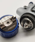 Close-up of LVMP Spray Gun Pro Grade Workhorse With 1.3mm Tip and 600ml Cup Feed, focusing on ergonomic palm fit handle and nozzle.