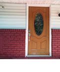 Front door with Easy DIY Electronic Keypad Door Knob Lock Set With Backup Mechanical Key, installed on wooden exterior door