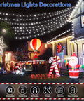 Festive yard with 1000 LED Outdoor Christmas String Lights 403 Ft With 8 Modes IP44 Waterproof Fairy Lights Timer and Dimmable Function Cold White on display.