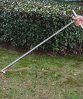 Heavy Duty Stainless Steel Manhole Cover Hook With Chunky Thick Handle Rock Solid T Shaped Grip For Pro Contractors And Builders Designed To Haul Heavy Loads Without Breaking A Sweat in use outdoors.