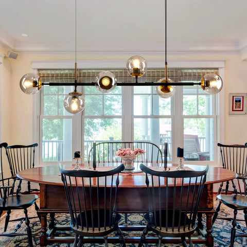 Mid-Century Glass Globe Pendant Light Fixture In Black And Gold, Semi-Flush Ceiling Chandelier above dining table