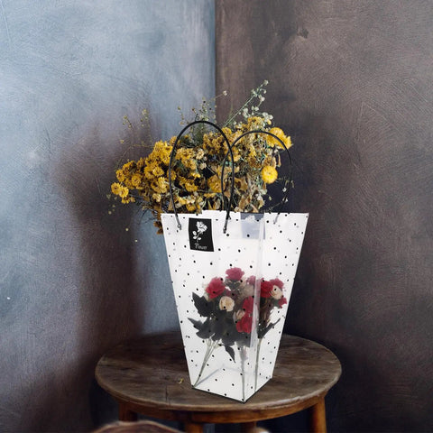 Flower Bouquet Wrap Bag With Handle For Easy Carry And Display, Plastic Rose Packaging Bag on wooden table with fresh flowers