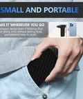 Person placing small Powerful Compressed Air Duster Electric Blower With 3 Speed Settings And Fast Charging into pocket