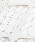 Close-up of Six Pack 12x12x1 MERV 11 air filters for furnace and AC with a focus on the filter's white pleated material and grid design.