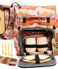 Picnic Backpack For Two With 14 Piece Insulated Cooler Set featuring cactus print and accessories visible, including tumblers and plates.