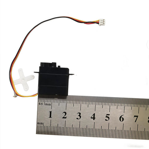 Ultra Micro 4.3g Digital Servo PS1319 Replacement for VOLANTEX RC Aircraft next to ruler