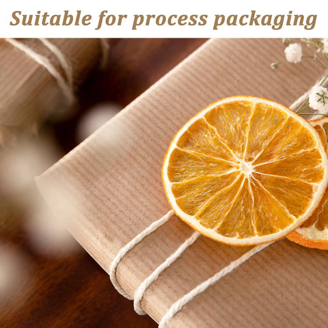 Food Grade Cotton Twine For Cooking And Baking 2mm Thick 8 Ply Extra Strength Kitchen Rope 328ft Beige used in gift wrapping with dried orange.