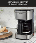 Compact Five Cup Coffee Maker With Stainless Steel Design And Pause And Brew Function Keep Warm Reusable Filter Drip Free Carafe Perfect For Small Kitchens Or Offices on kitchen counter