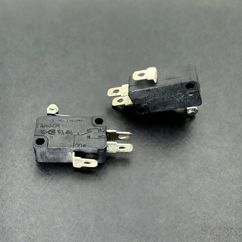 Roller Lever Micro Switch With 3 Pin SPDT Heavy Duty Limit Switch 16A 125V And 250V AC OEM Replacement laying on black surface