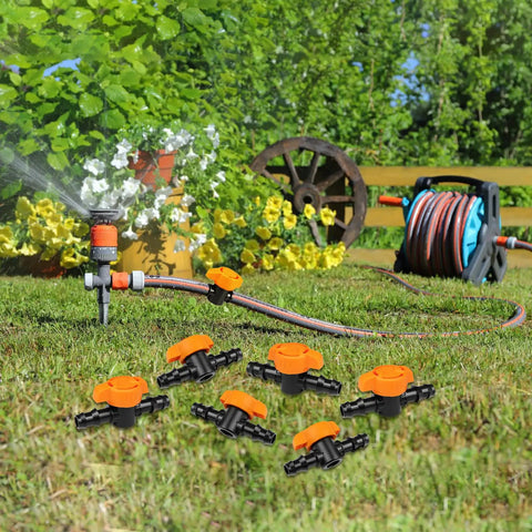 12 Pack Drip Irrigation Barbed Shut Off Valves For 1/2 Inch Tubing in garden setting with hose and sprinkler