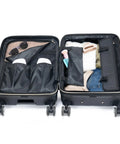 Open Madison Square Lightweight Hardside Chevron Expandable Spinner Luggage Set showing interior compartments and packed items.