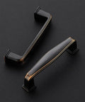 Close-up of 30 Pack Solid 3 Inch Oil Rubbed Bronze Cabinet Handles for kitchen cabinets and drawers on black background.