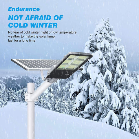 Solar Powered 300W LED Street Light For Outdoors Waterproof Dusk To Dawn Parking Lot Lighting With Remote Control Aluminum White Finish 30000 Lumen Mega Bright Outdoor Fixture in snowy setting