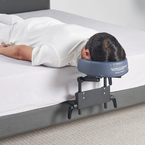 Home Mattress Top Massage Kit In Royal Blue With Adjustable Height from 3 To 17 Inches in use with person lying face down