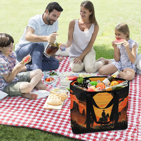 Family picnic with reusable Western Desert Cowboy style insulated cooler bag, large capacity, on red checkered blanket.