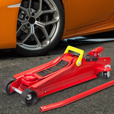 Heavy Duty Hydraulic Low Profile Floor Jack With Quick Lift Pump, 2.5 Ton Capacity, Trolley Style For Sedans, Durable Steel Construction, Single Piston Lift, Lifts From 3.33 Inches To 15 Inches, Red next to car tire