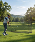 Golfer using Heavy Duty Golf Practice Net 10x7 Feet With Sturdy Frame And Quick Setup Portable Hitting Net in outdoor setting