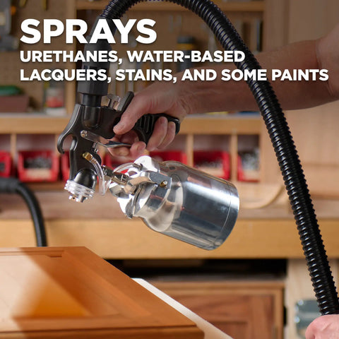 Stationary Hvlp Finishing Sprayer For Woodworkers Wanting Killer Results On Furniture Restoration Projects Using Pro Grade Metal Spray Gun for spraying a wood panel.