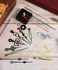 DIY Wall Clock Kit With Quartz Movements And Battery Operated Clock Motors displayed on wooden surface with various hands and numerals.