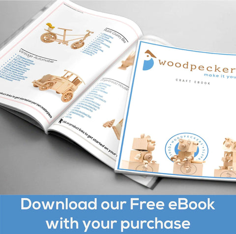 Woodpeckers craft eBook cover; open catalog showing wooden model projects and light birch-toned pages