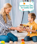 14-piece Montessori toy kitchen knife set for kids, woman hands boxed set to a smiling boy in a living room with blocks