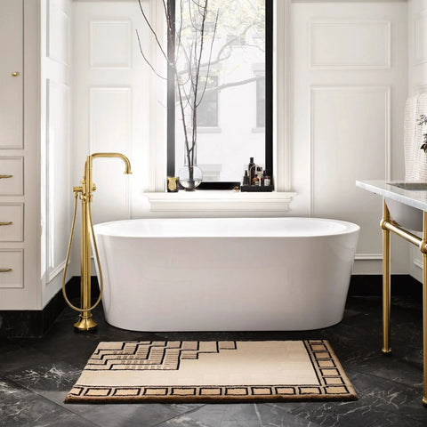 Elegant bathroom with freestanding tub and brushed gold fixtures, including Colinet Brushed Gold Hand Towel Ring For Your Bath Easy Mount No Fuss Install Durable Satin Finish Coordinates With Colinet Faucets Adds Subtle Luxury And Flexible Placement In Any Space.