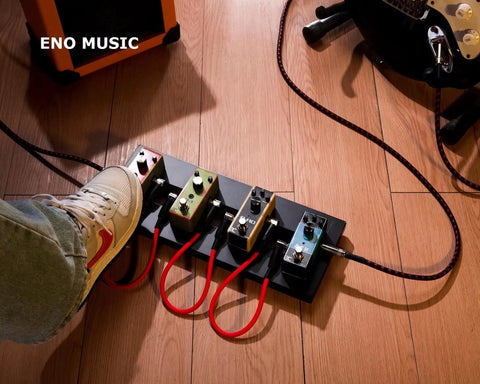 Guitarist using Compact 14 Inch Guitar Pedal Board With Solid Build And Lightweight 350 g 14 By Five And A Half By One Inch