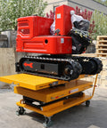 Boss Grade Electric Hydraulic Lift Table With 2600 Lbs Capacity And Dual Locking Casters, Mobile Scissor Cart For EV Battery Packs And Transmissions with red electric motor.