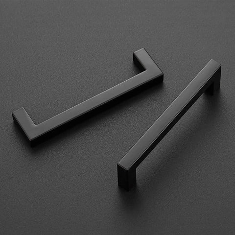 Black 5 Inch Square Cabinet Pulls For Kitchen Cabinets And Cupboards Durable Stainless Steel Hardware With Drill Mounting Template 55 Pack Easy To Install Modern Look, shown in two pieces on black background.