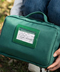 Green Rhino Rescue pet first aid kit in fabric case with Pet Emergency Information Card
