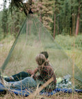 No See Um Mosquito Netting Large For Sleeping Bags And Cots, Durable Polyethylene Shelter That Blocks Tiny Mosquitoes in use outdoors