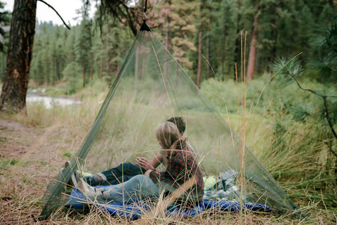 No See Um Mosquito Netting Large For Sleeping Bags And Cots, Durable Polyethylene Shelter That Blocks Tiny Mosquitoes in use outdoors