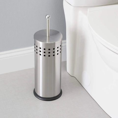 Slick Brushed Metal Toilet Plunger With Spill Proof Canister And Wall Mount Holder For Bathroom Corner Storage next to toilet.