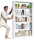 Man arranging Beefy Metal Five Tier Adjustable Book Shelf In White Tall 68.9 Inches High By 36 Inches Wide Heavy Duty Bookcase