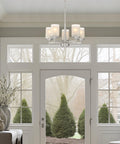 Modern Farmhouse 19 Inch 5 Light Chandelier In Brushed Nickel Finish With Frosted White Linen Glass Shades Contemporary Ceiling Fixture For Dining Room Or Entryway in a bright entryway