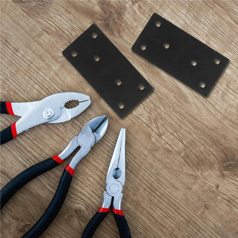 Heavy Duty Stainless Steel Mending Plates, Flat Metal Brackets For Quick Cabinet Fixing And Wood Repair, Zero Hassle Install With Included Screws, Solid As A Rock Furniture Reinforcement Kit Pack Of Ten with pliers on wooden surface.