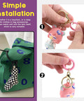 Hands attaching pink O ring to keychain for bag, 32Pcs 8 Colors 25mm 1 Inch Round Spring O Rings Assortment Kit